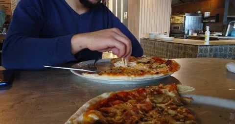 The man eating pizza Stock Footage 170257046
