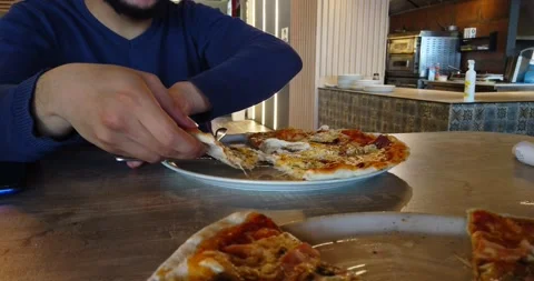 The man eating pizza Stock Footage 170257159
