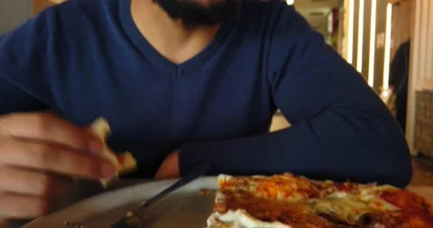 The man eating pizza Stock Footage 170257228