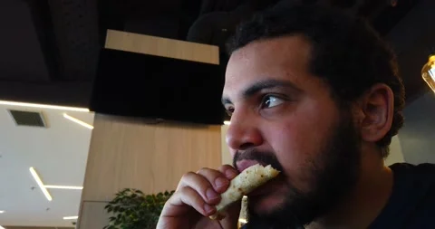 The man eating pizza Stock Footage 170257252