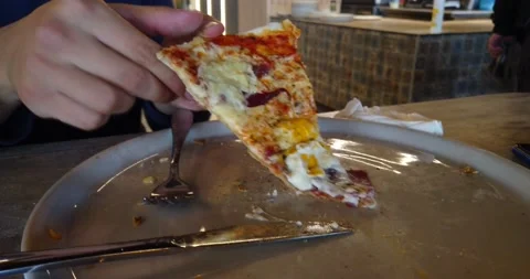The man eating pizza Stock Footage 170257261