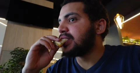 The man eating pizza Stock Footage 170257305