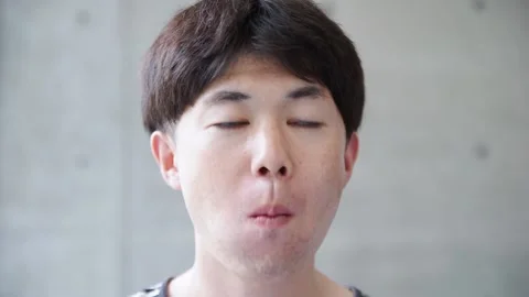 A man eating rice balls Stock Footage 147600738