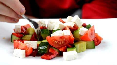 Man eating vegetable salad Stock Footage 36805164