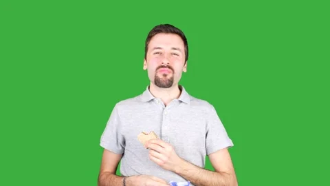 Man eating wafer biscuit Stock Footage 237243148