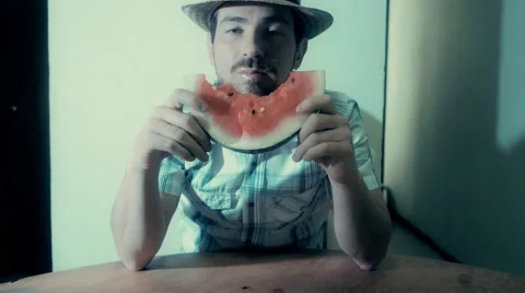 Man eating watermelon Stock Footage 62651146