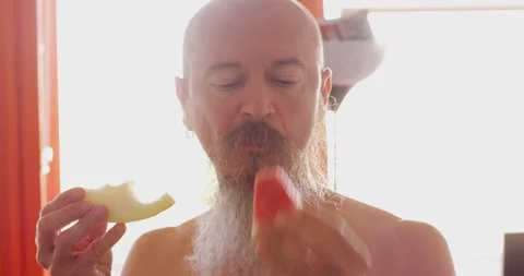 Man eating watermelon Stock Footage 115953969