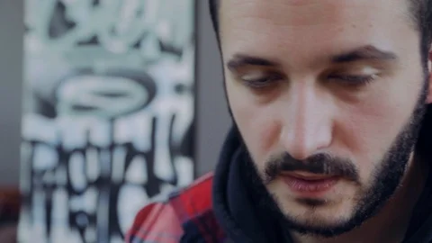 Man eats a chocolate cookies in a cafe face male adult closeup sweet eat bread 스톡 동영상 109462258