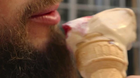 A man eats delicious ice cream Stock Footage 277744531