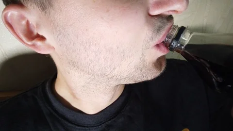 Man eats fast food biting pizza slice extreme close up Video stock 116123653