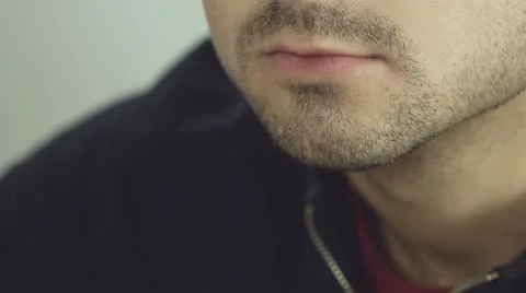Man eats hamburger Stock Footage
