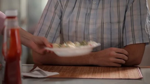 Man eats hot dumplings Stock Footage 100122818