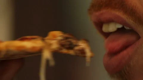 Man eats Pizza Stock Footage