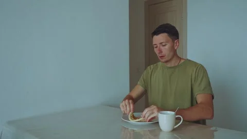 A man eats pizza, a man enjoys pizza Video stock 315361125