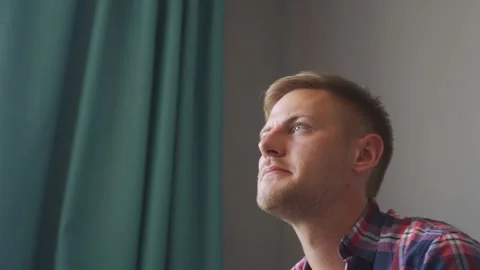 Man eats popcorn and watches tv. Stock Footage 221399581