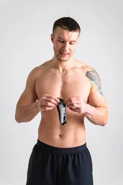 Man eats protein bar on white background isolated protein healthy, eating man Foto stock