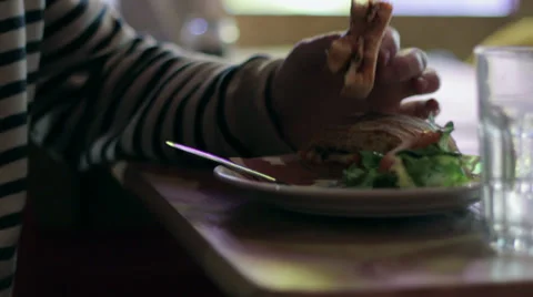 Man eats sandwich &amp; drinks water CU 库存影片 35191139