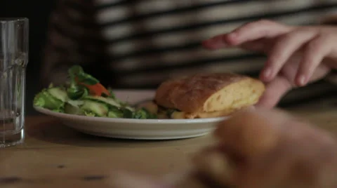 Man eats sandwich &amp; drinks water ECU 库存影片 35191265