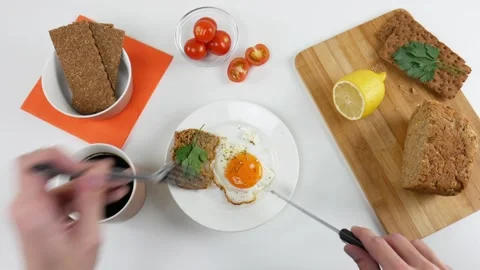 A man eats scrambled eggs. Time lapse. Top view Stock Footage 99664863
