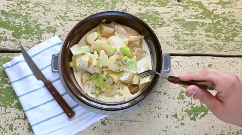 Man eats a Turkey stewed in cream, top view Stock Footage 51412049