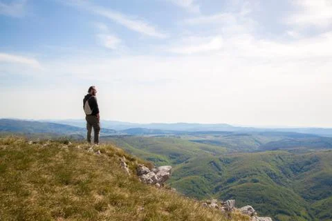 A man on the edge of a cliff Stock Photos