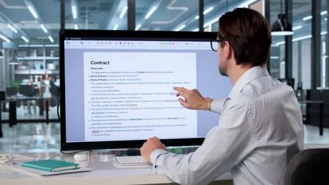 Man Editing Handwritten Document On Computer Stock Footage 335458073