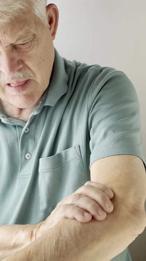 Man with elbow pain vertical Stock Footage 219237942