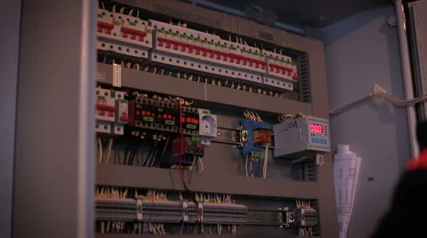 Man is in electrical energy distribution substation Stock Footage 57756932