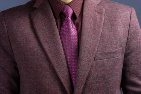 Man in elegant custom tailored expensive suit. Close up. Stock Photos