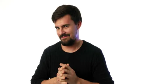 Man embarrassedly looks at the camera 스톡 동영상 93600166