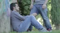a man embraces his friend who is crying for comfort HD Footage