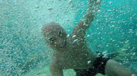 Man Emerging from Underwater Stock Footage 50626050