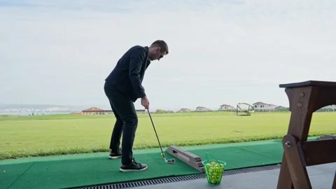 Man emotionally plays golf Video stock 164921792