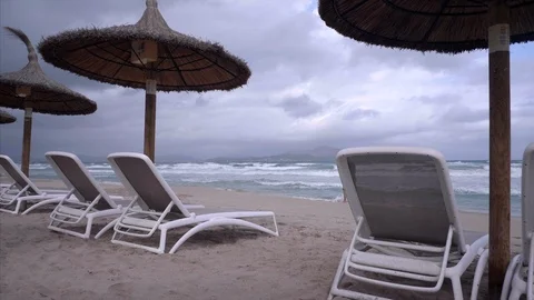 Man on empty Spanish beach Stock Footage 98435405