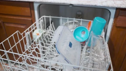 Man Emptying Dishwasher Video stock 142528877