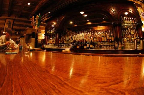 Man at the end of the bar having a beer at the Owl Bar, Sundance Resort, Utah Stock Photos