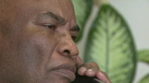 Man ends conversation hangs up Stock Footage 479748