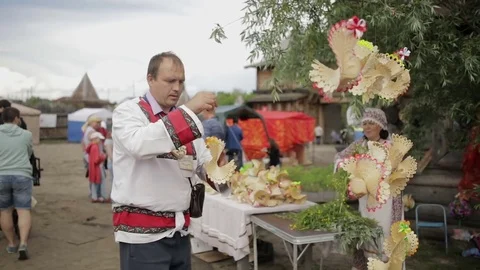 Man is engaged in figurines from a tree Stock Footage 82359868