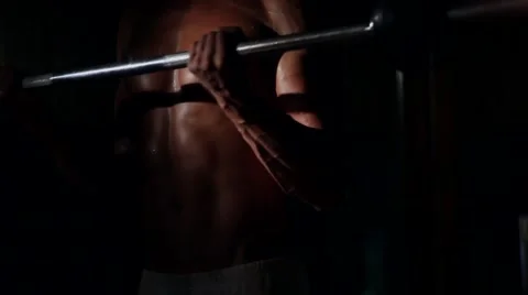 The man is engaged in in the gym Stock Footage 64221483