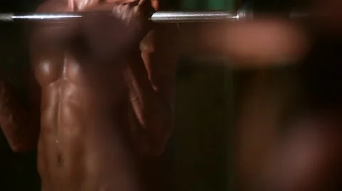 The man is engaged in in the gym Stock Footage 64221613