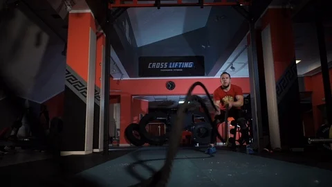 The man is engaged in krosslifting Stock Footage 71950625