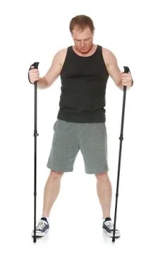 The man is engaged in Nordic walking Stock Photos