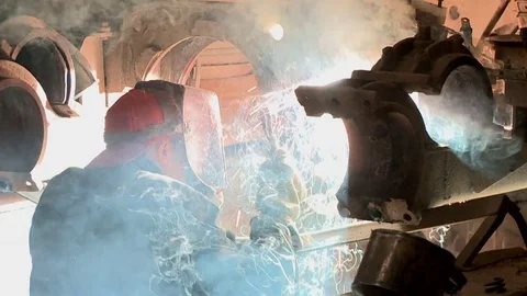 The man is engaged in welding work Stock Footage 79435369