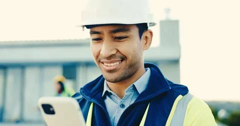 Man, engineer and phone at site for construction, research and email client for Stock Photos