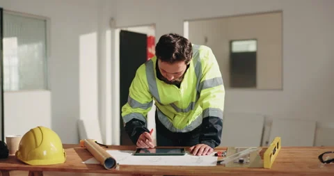 Man, engineer and tablet with document for construction, blueprint and sketch Stock Footage 341567751