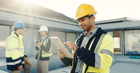 Man, engineer and tablet at site for construction, research and checklist for Stock Photos