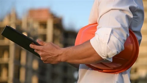 Man engineer checking construction project Video stock 79367443