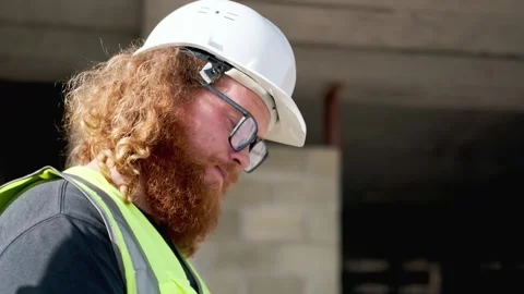 Man engineer contractor problem solving with digital tablet at construction site Stock Footage 274481368