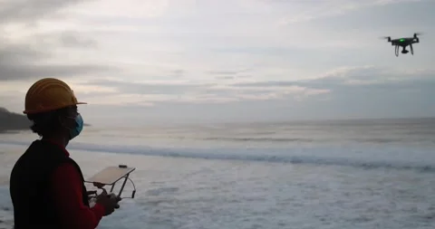 Man engineer flying with drone Stock Footage 145430802