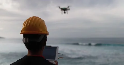 Man engineer flying with drone while wearing protective mask 스톡 동영상 145430903